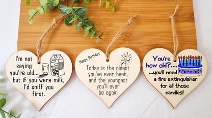 Set of 3 Hanging Decorations Wooden Hearts Funny Birthday Card Alternative | You're How Old? | If You Were Milk I'd Sniff You 1st